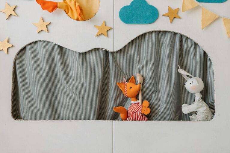 A whimsical puppet show featuring colorful fabric puppets on a playful stage.